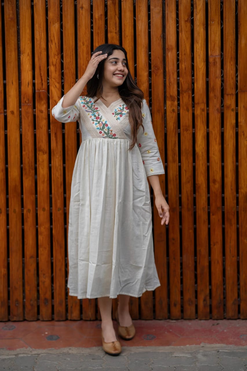 Detailing with floral embroidery on yoke and sleeves