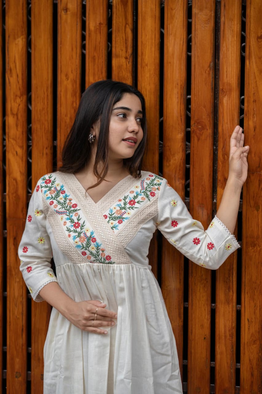 Detailing with floral embroidery on yoke and sleeves