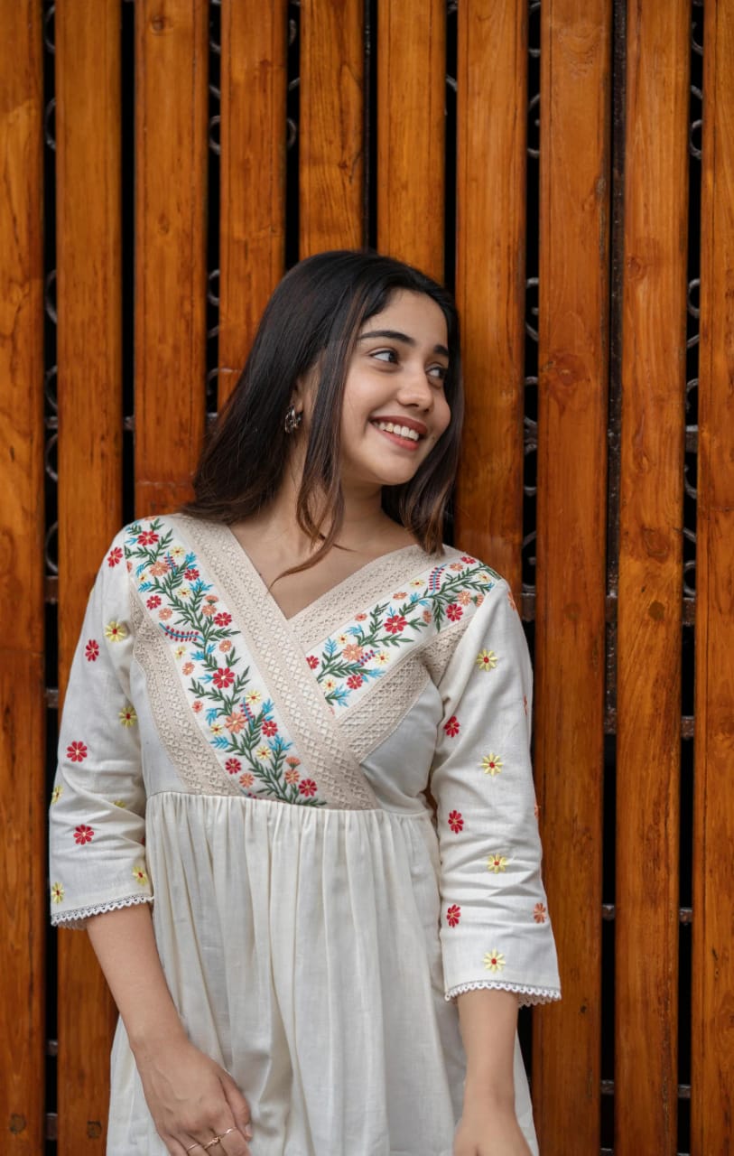Detailing with floral embroidery on yoke and sleeves